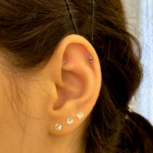 Titán talpas piercing