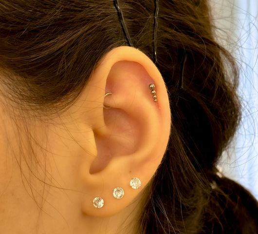 Titán talpas piercing